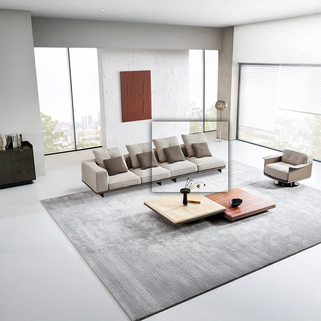 Avenor armless 2-seater sofa by BEACON, featuring modern design with plush cushions, in a cozy living room setting.
