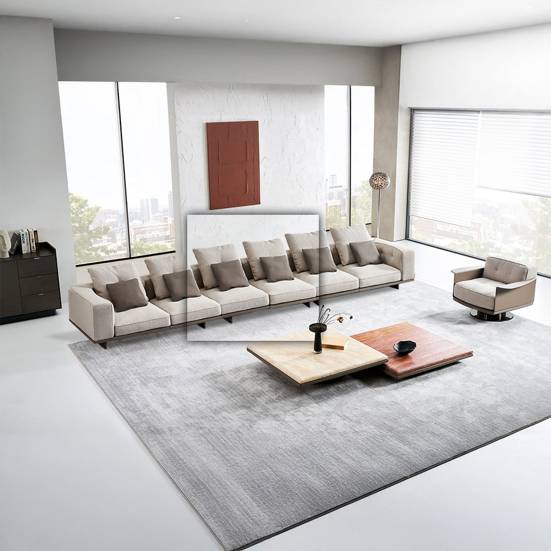 Avenor armless 2-seater sofa by BEACON featuring modern design with plush fabric and clean lines in a cozy living room setting.