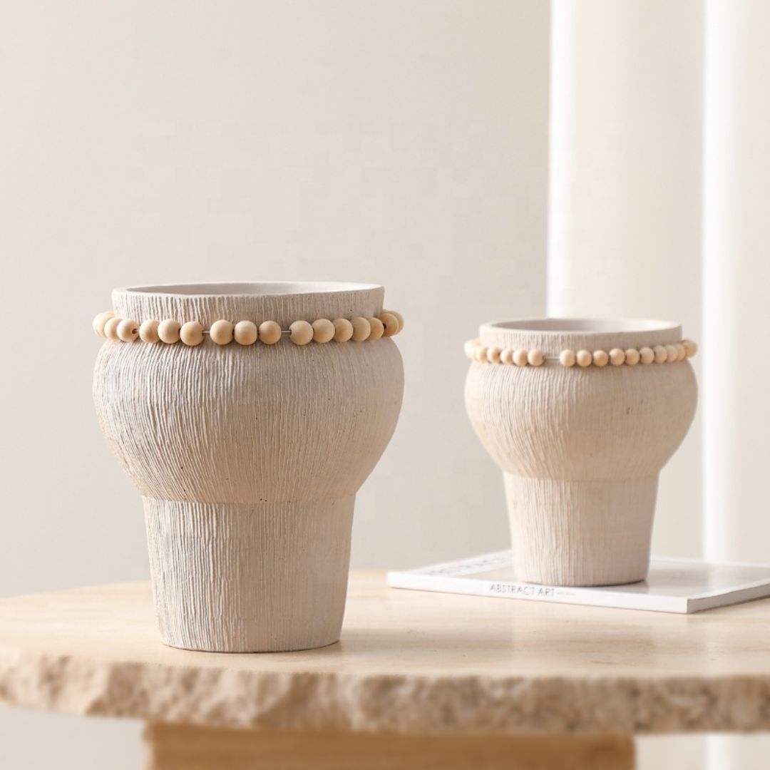 Beige cement vase with bead detail from BEACON, showcasing a modern decorative vase design for home decor.