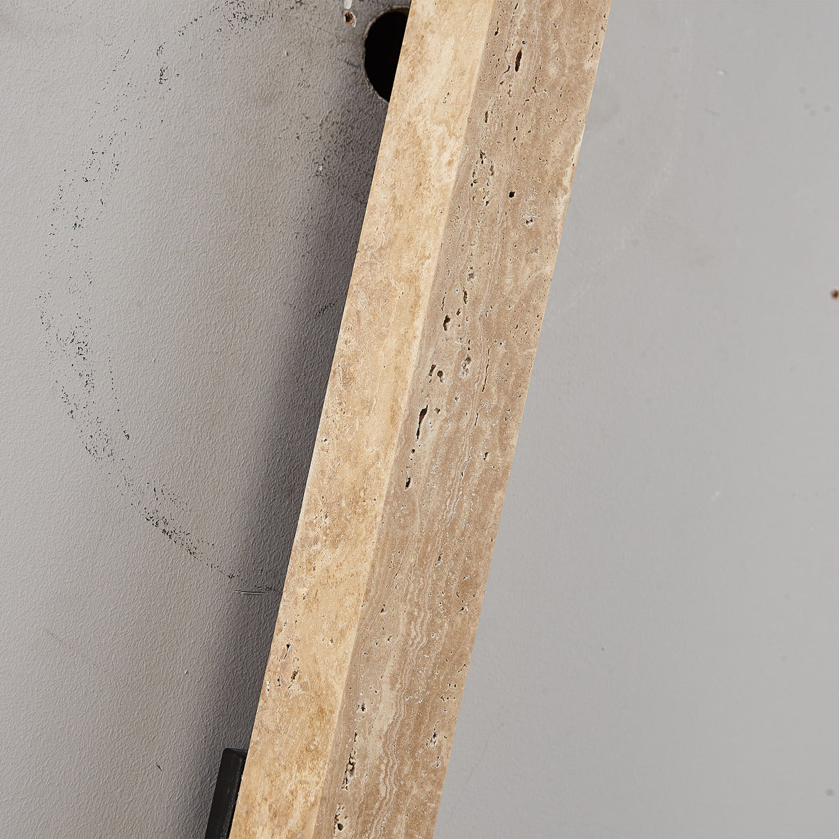 Beige natural travertine marble wall lamp by BEACON, featuring a sleek, modern design perfect for contemporary interiors.