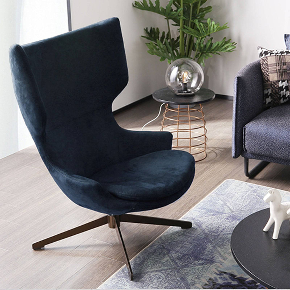 BEACON Biel Lounge Chair LC031M with cushioned seat and modern design, shown in a cozy living space.