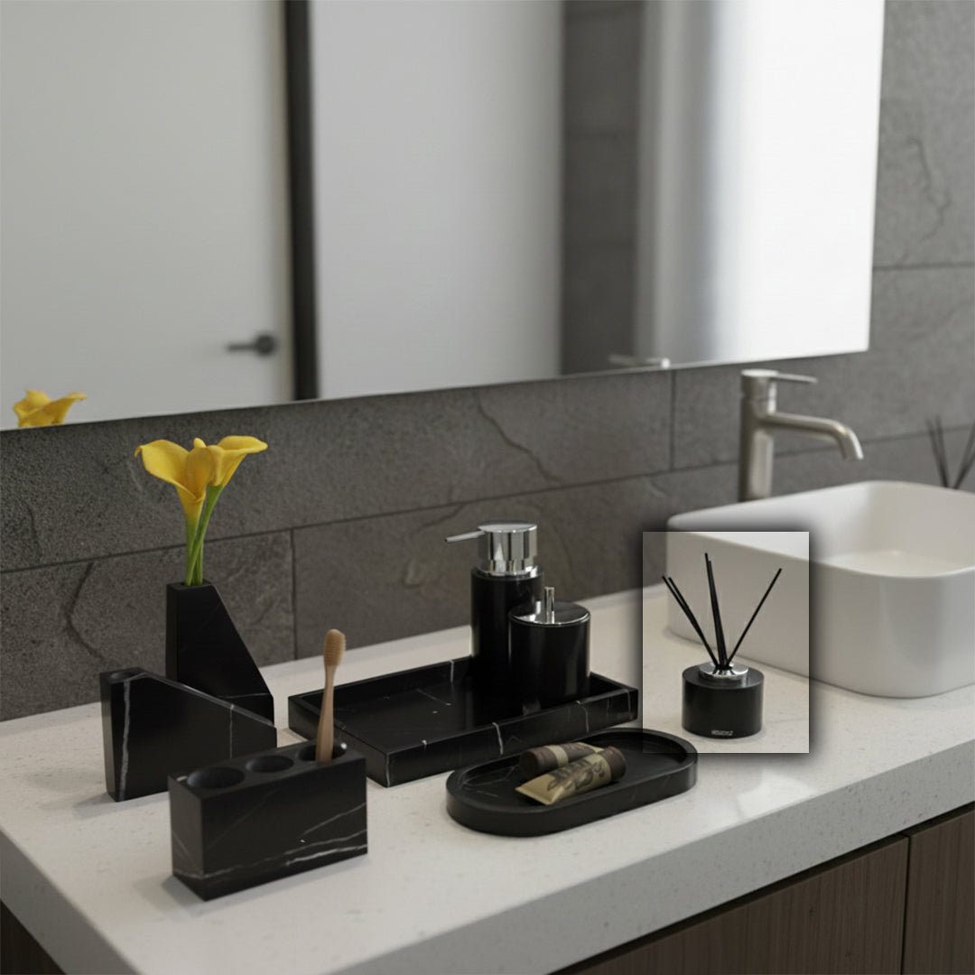 Black and white marble circular fragrance bottle with silver accessory, designed for BEACON stick diffusers.
