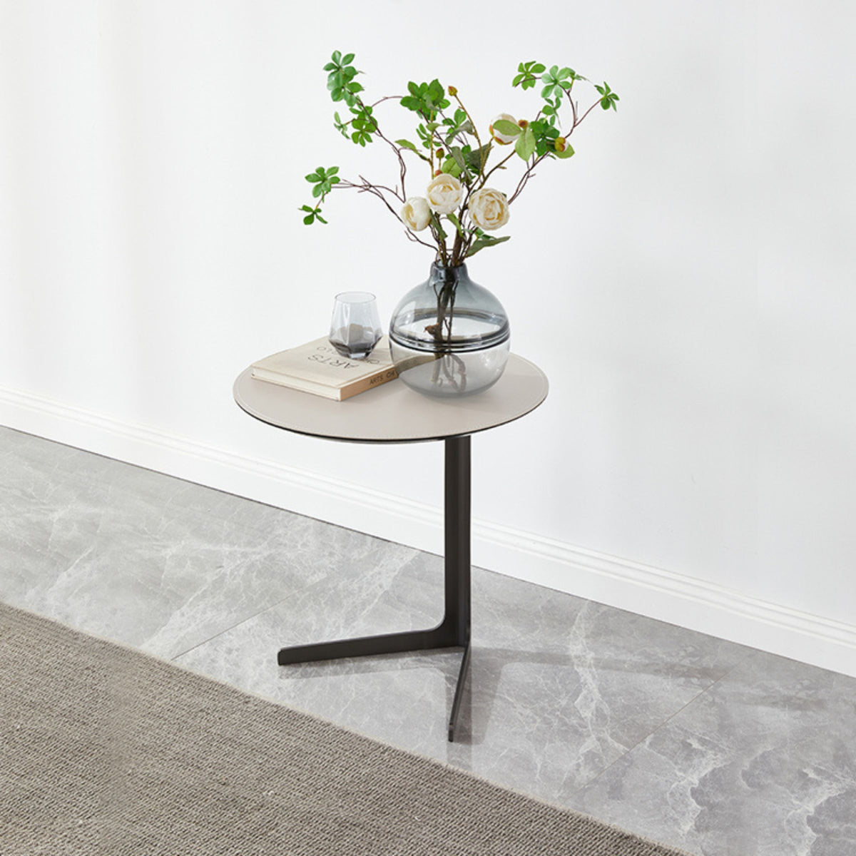 Black saddle leather side table with black legs by BEACON, model MLL-D75 BL, featuring a sleek, modern design.