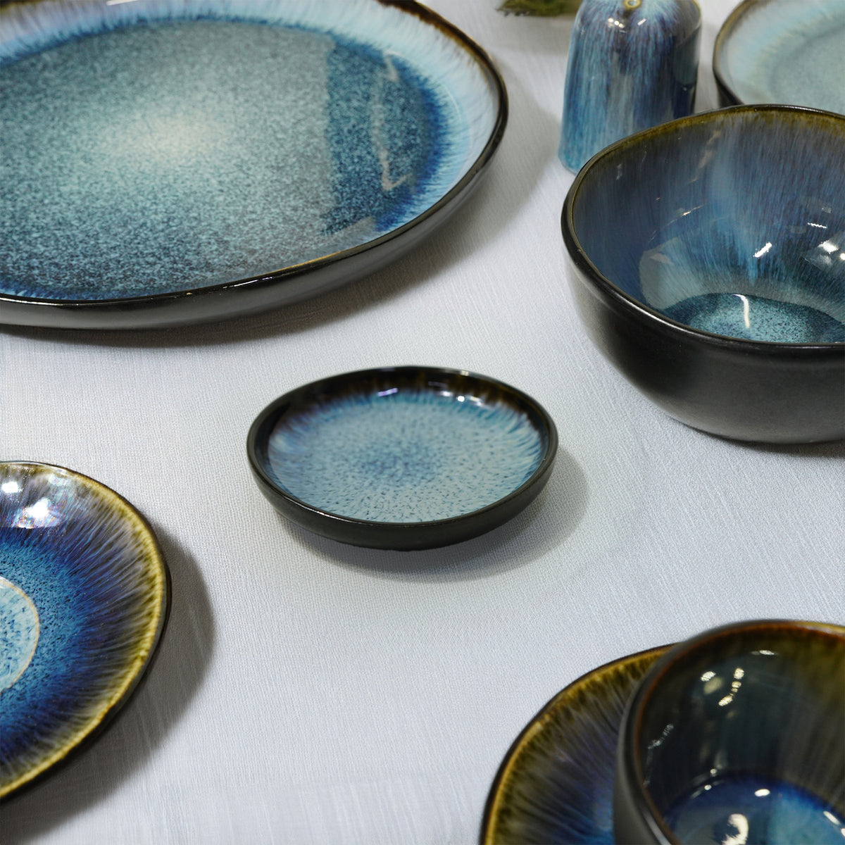Blue Wave Black and Blue Plate from BEACON, featuring a stylish black and blue wave design on a ceramic plate.