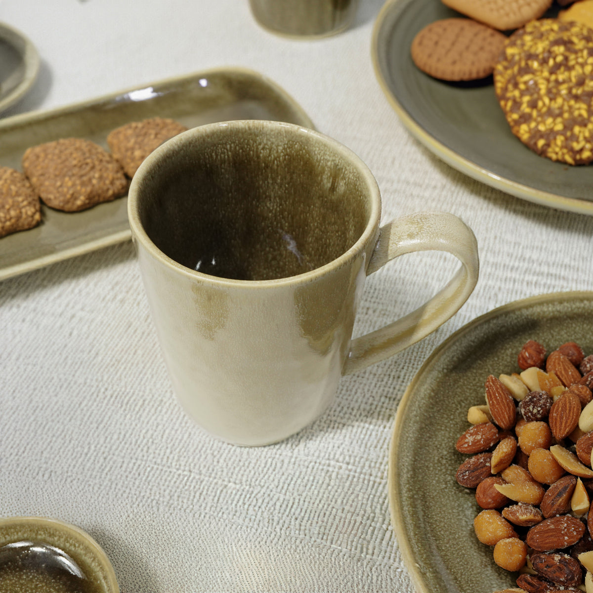 Grey and brown reactive glaze mug by Beacon, with a warm, textured ceramic finish, perfect for coffee or tea.