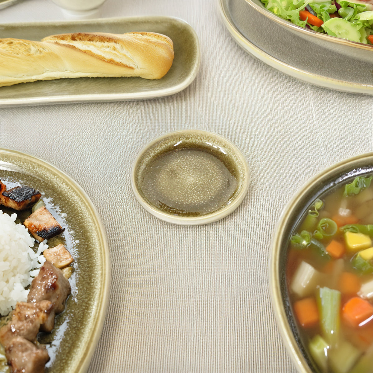Dark grey BEACON plates from the Browny Soil Dish collection, made of durable ceramic with a matte finish.