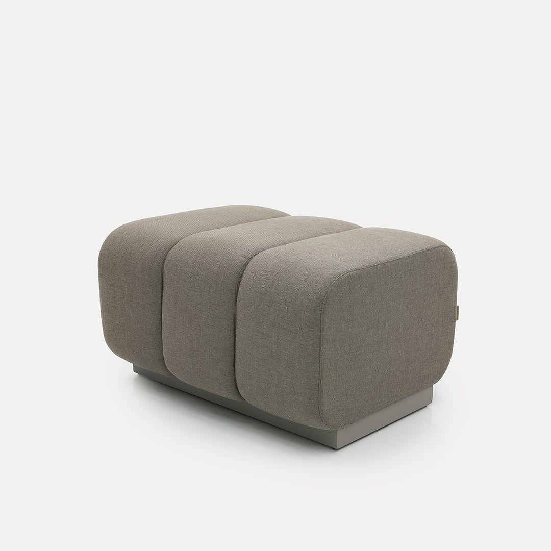 Brown Chameleon Sofa Pouf Module by BEACON, versatile sofa piece with modern design, shown in a living room setting.