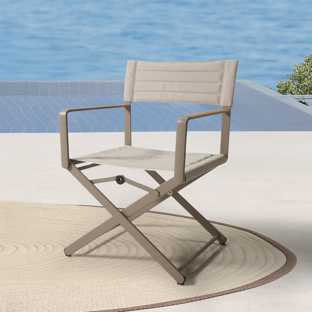 BEACON Chic Deluxe outdoor folding armchair with cushioned seating and armrests, perfect for patio or garden use.