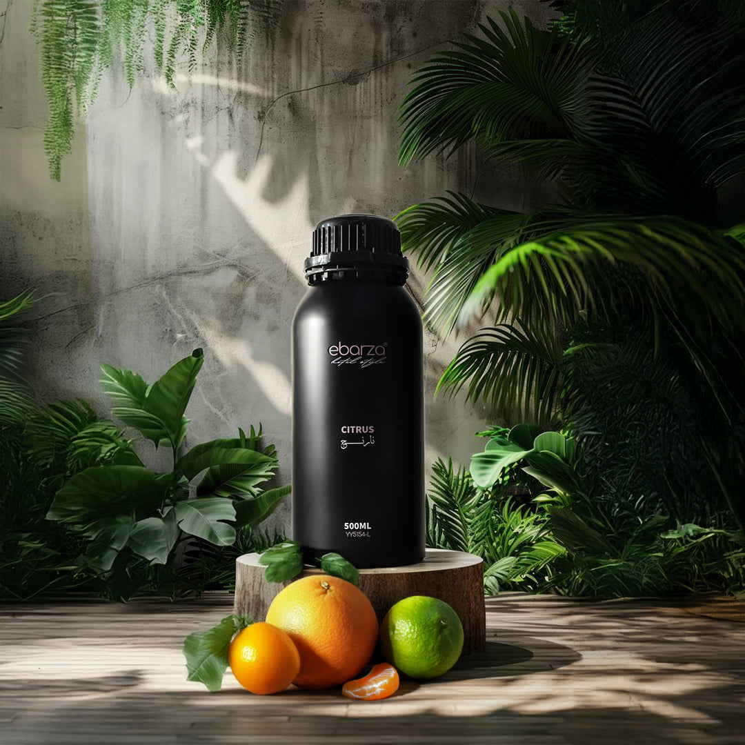 Bottle of BEACON citrus essential oil, 500ml size, with clear label and orange citrus fruit illustration on the packaging.