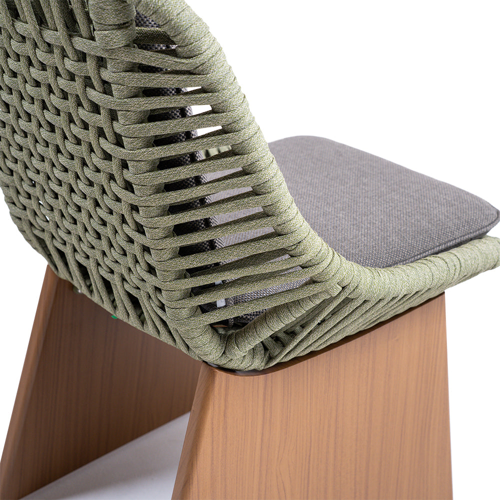Beacon Clogs dining side chair with seat and back cushions, featuring a modern design and wooden legs.