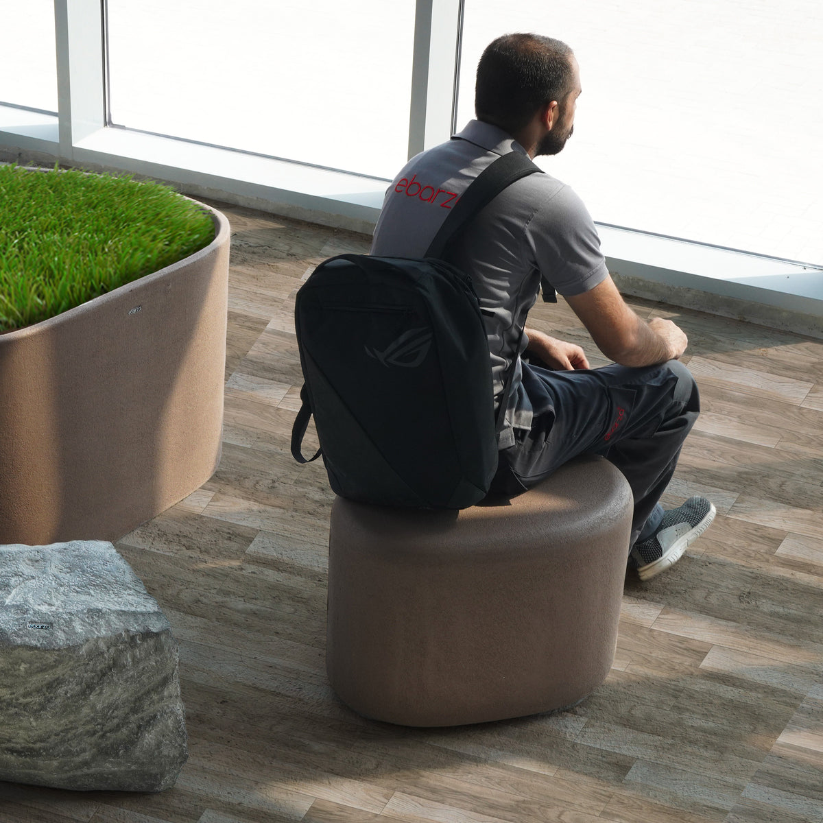 Coffee brown BEACON planter box and seating bench, durable outdoor garden furniture with integrated planting and seating features.