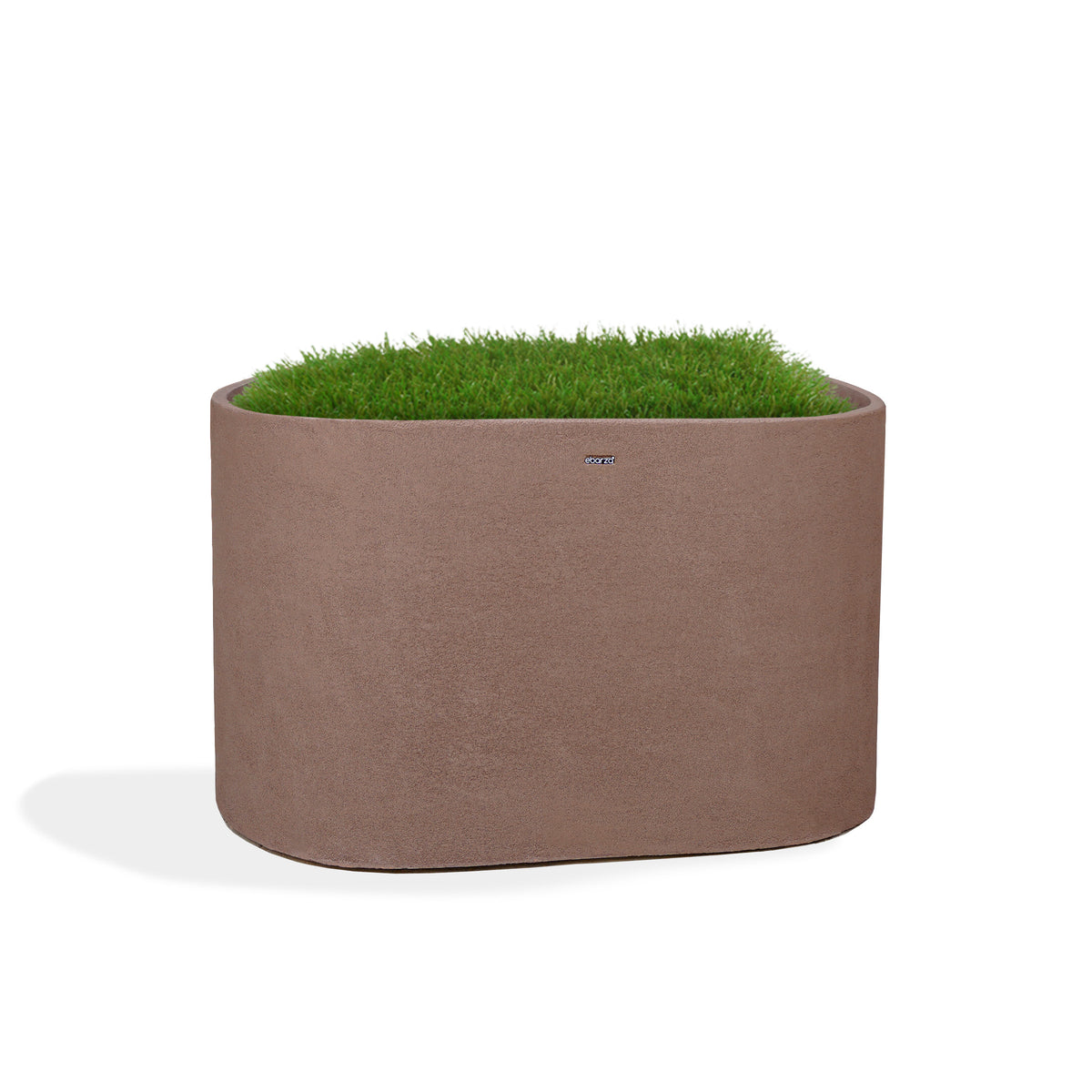 Coffee brown planter box by BEACON, made of durable material, shown with plants in the stylish, rectangular outdoor planter.