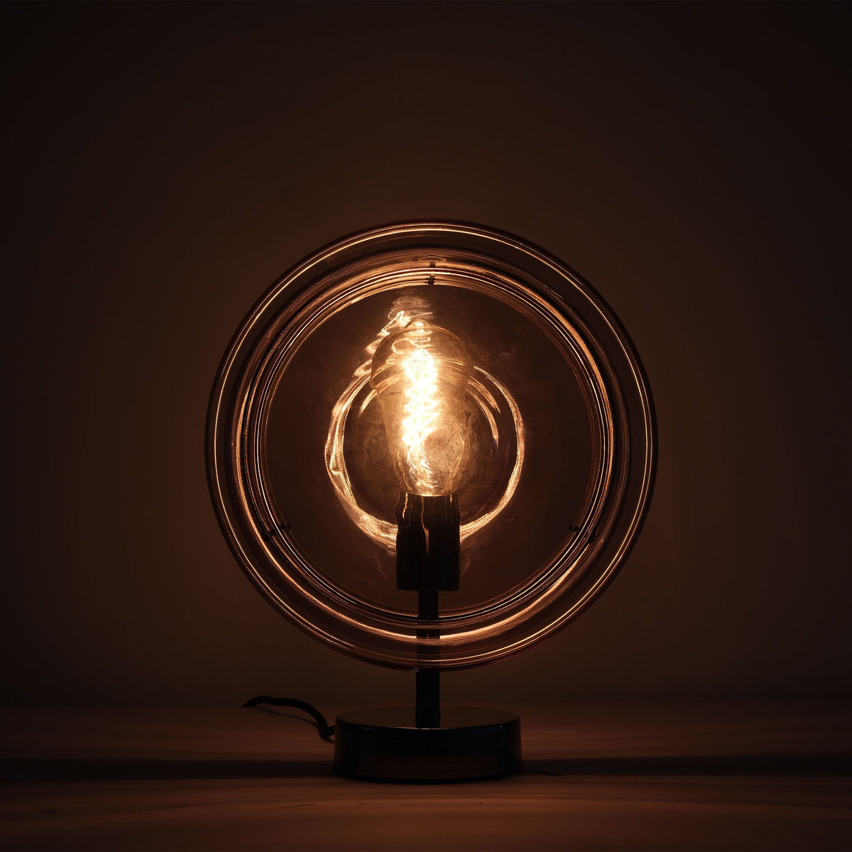 Cosmos Orb BEACON desk lamp with spherical design and warm light, ideal for modern home or office spaces.
