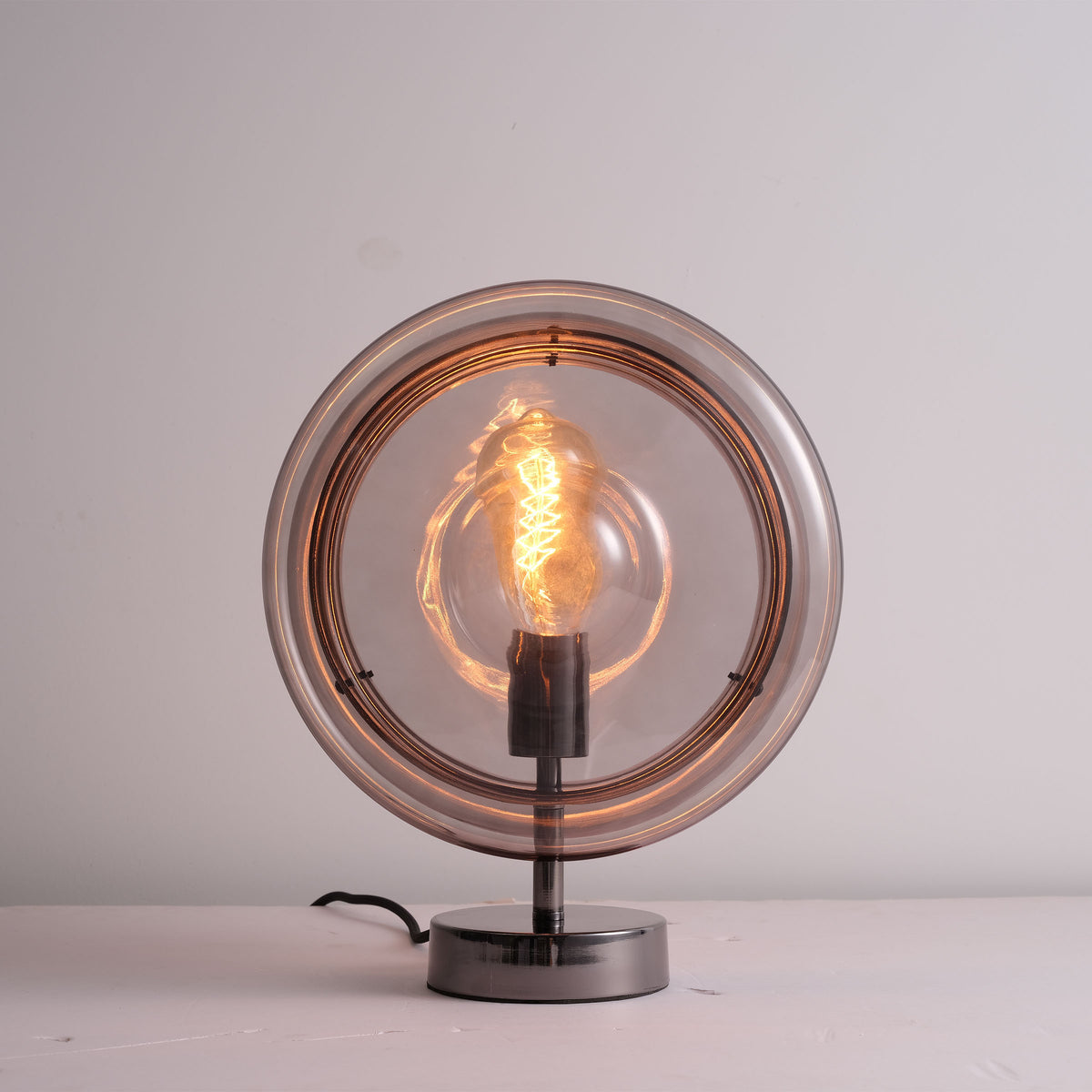 BEACON Cosmos Orb table lamp CY-TD-1049 on a desk, featuring a spherical design and modern illumination for home or office use