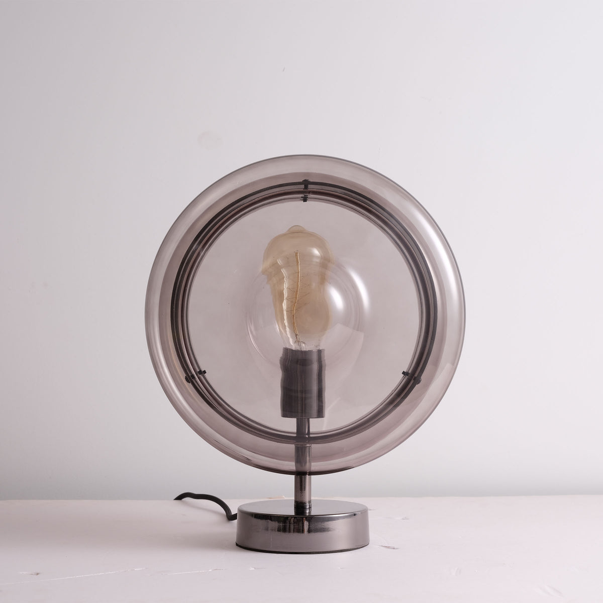 BEACON Cosmos Orb table lamp CY-TD-1049 on desk, featuring a round, celestial-inspired design in a modern table lamp style.