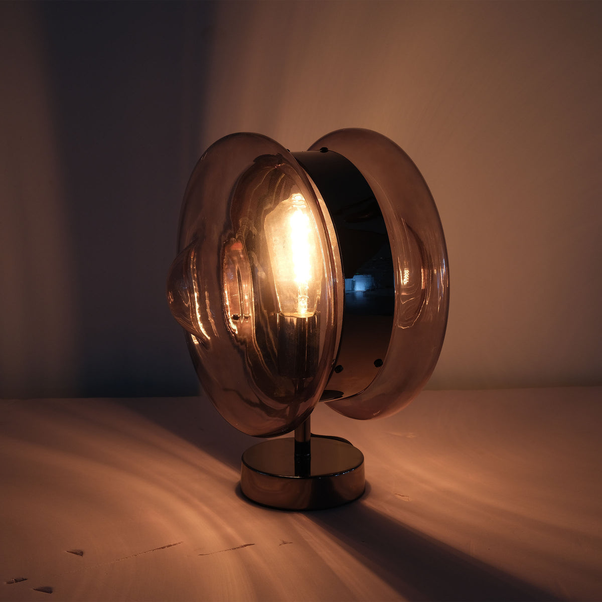BEACON Cosmos Orb table lamp CY-TD-1049 on a desk, featuring a spherical design and modern tabletop lighting.