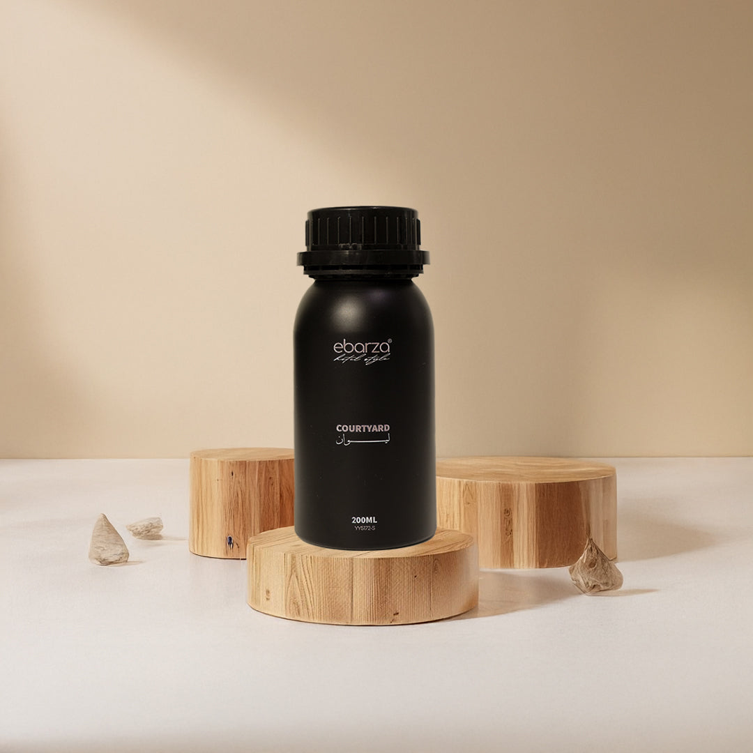 Courtyard Essential Oil in a 200ml bottle from Beacon, with a clear label and amber glass container for aromatherapy use.