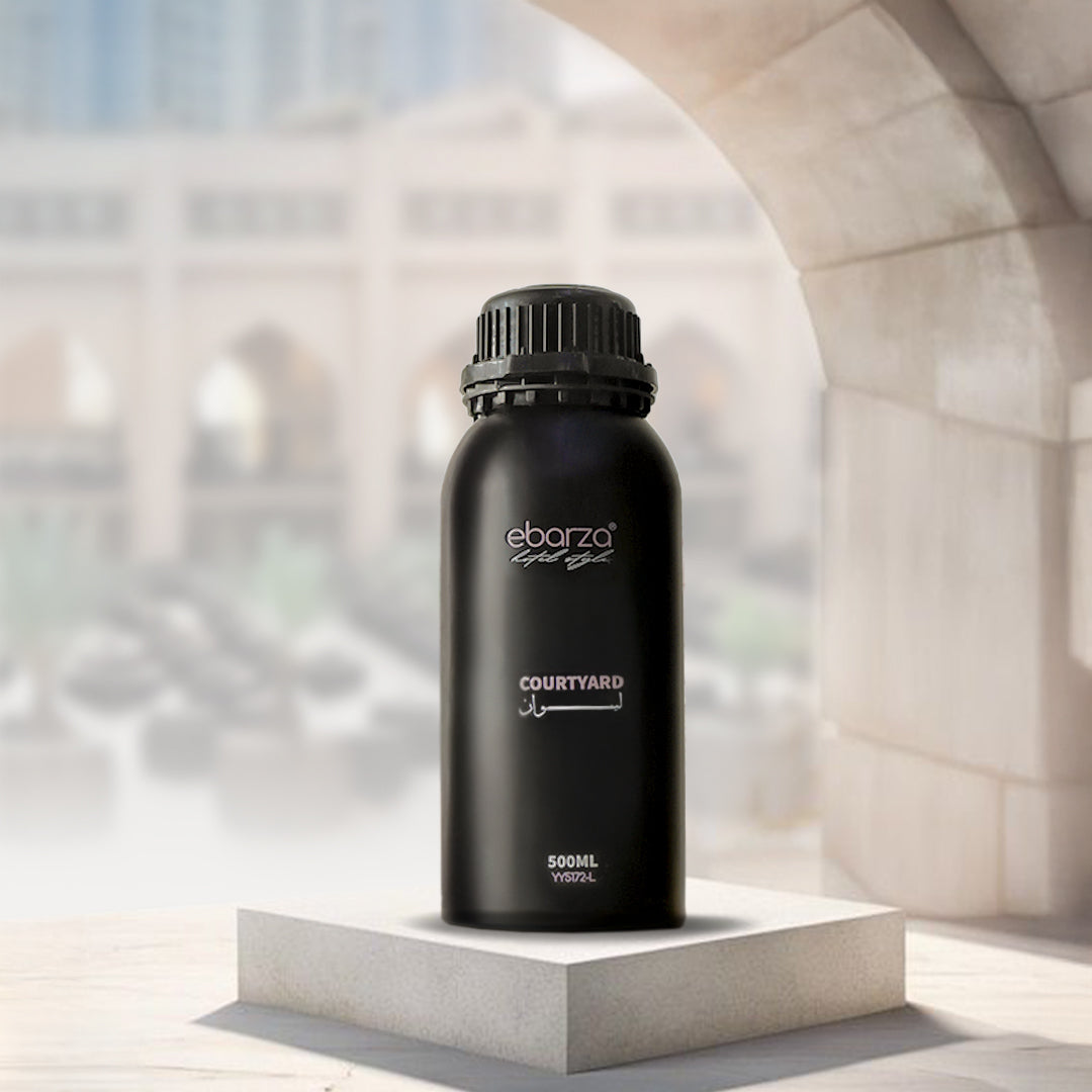 Courtyard Essential Oil in 500ml bottle by BEACON, featuring a clear glass container and natural essential oil inside.