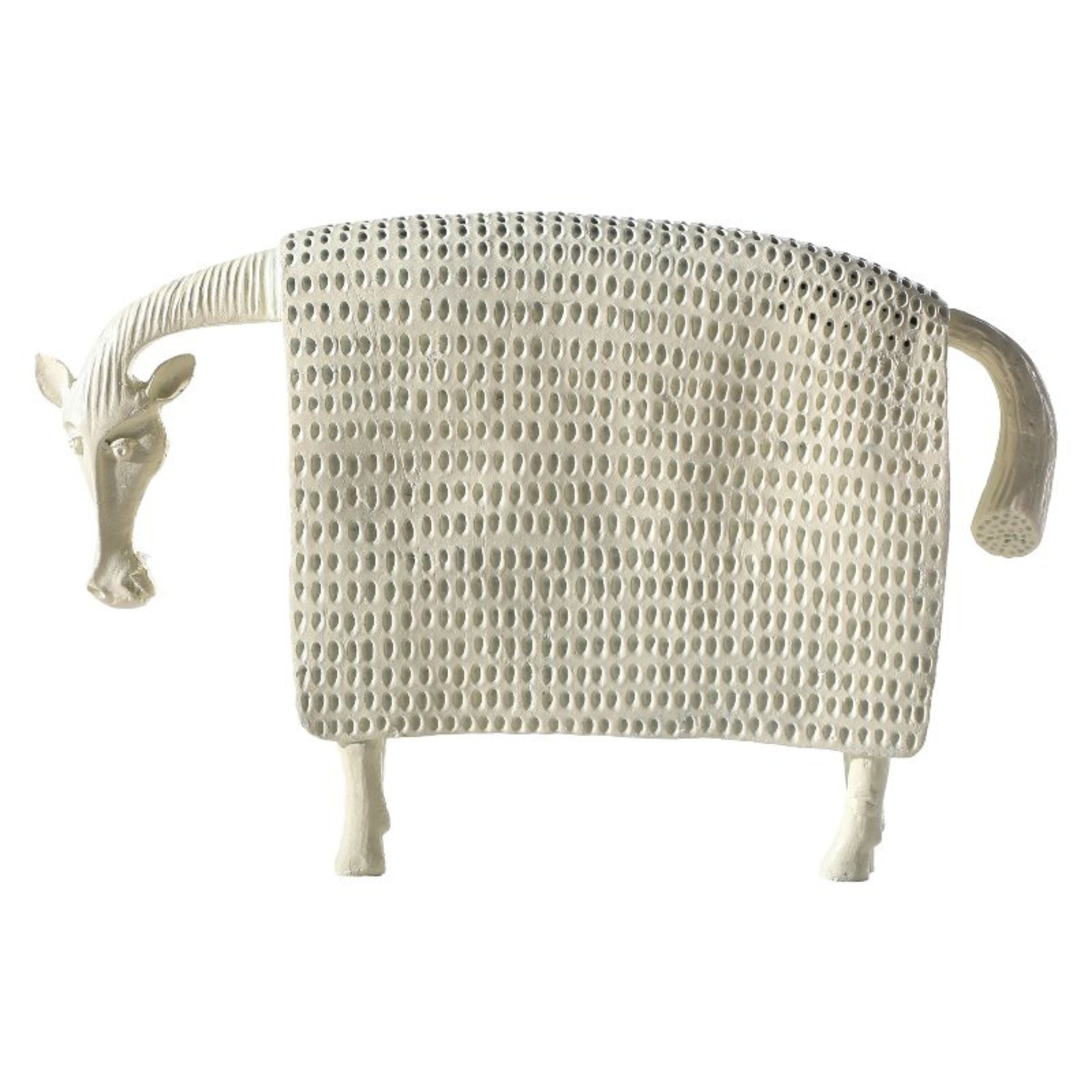 Beige cow figurine from Beacon home decor collection, detailed animal sculpture for decorative display.