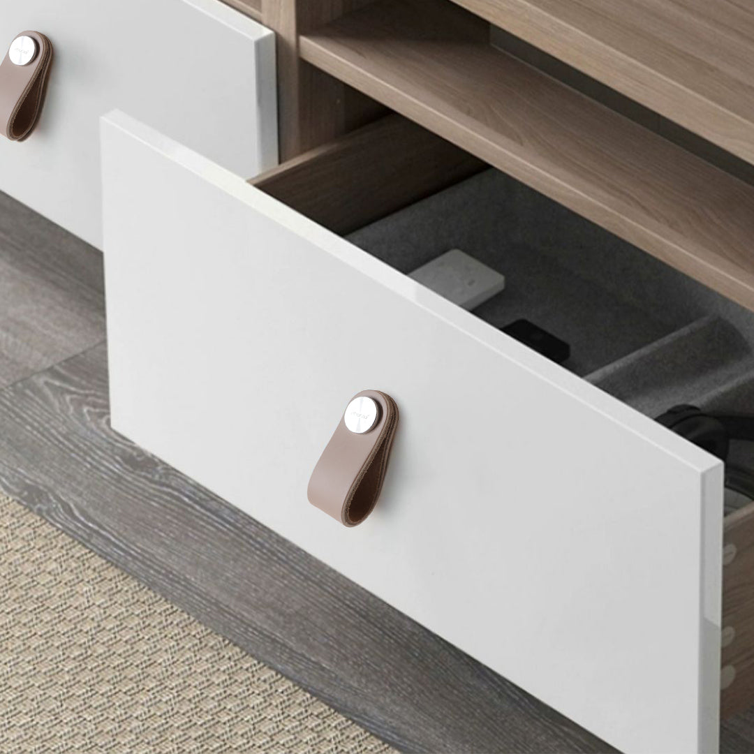 Cowhide layer and stainless steel button knob door handle by BEACON, featuring cowhide accents and sleek modern design.