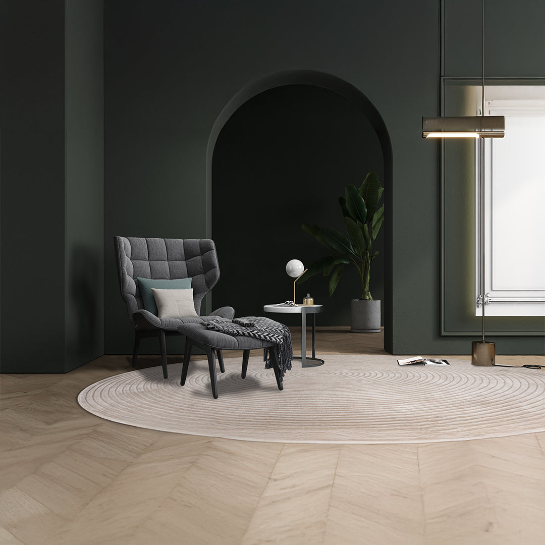 Gray wool rug by Javi, D300 cm size, featuring a soft texture and elegant design, ideal for modern living spaces.