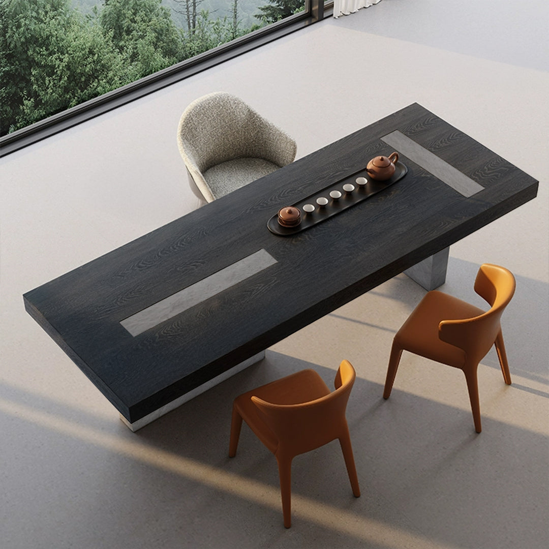 Dark Emperador rectangular dining table by BEACON with a polished stone surface and sturdy wooden legs.