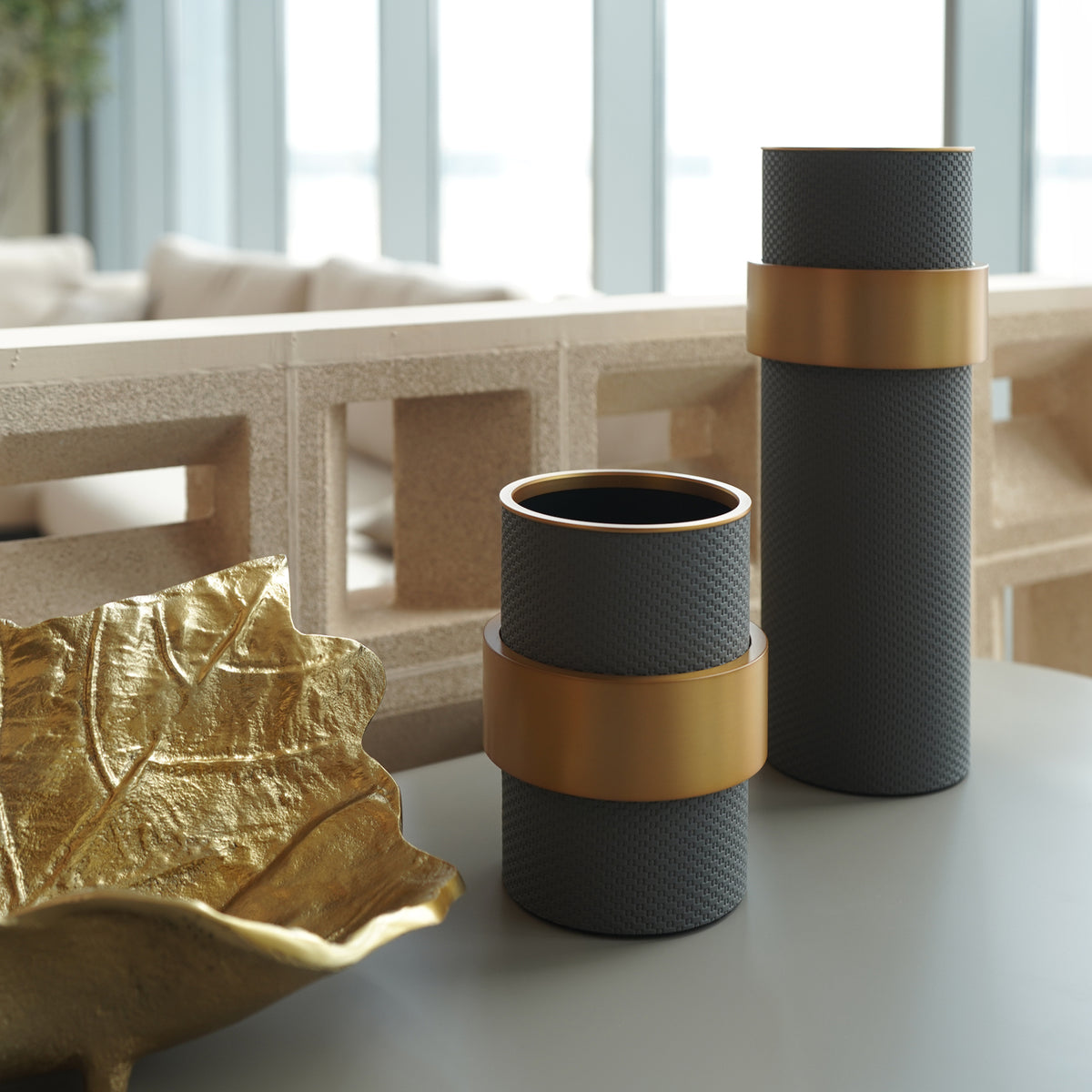 Dark grey Anqitu flower vase by Beacon, with a sleek, modern design, perfect for displaying floral arrangements.