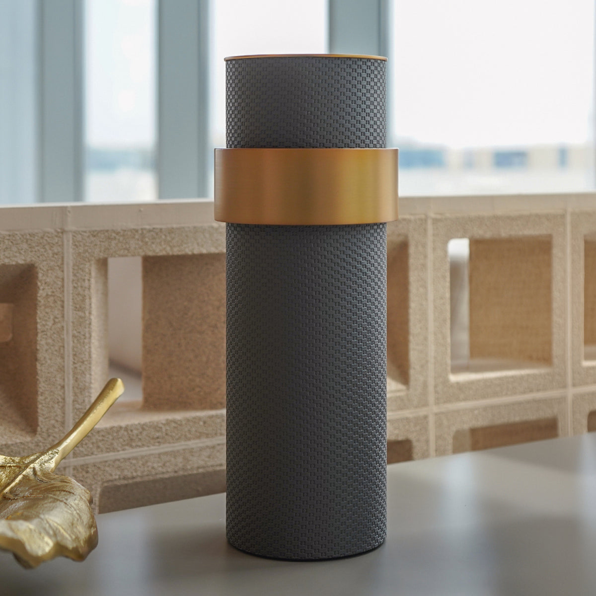 Dark grey Anqitu flower vase by BEACON, featuring a sleek, modern design perfect for elegant floral arrangements.