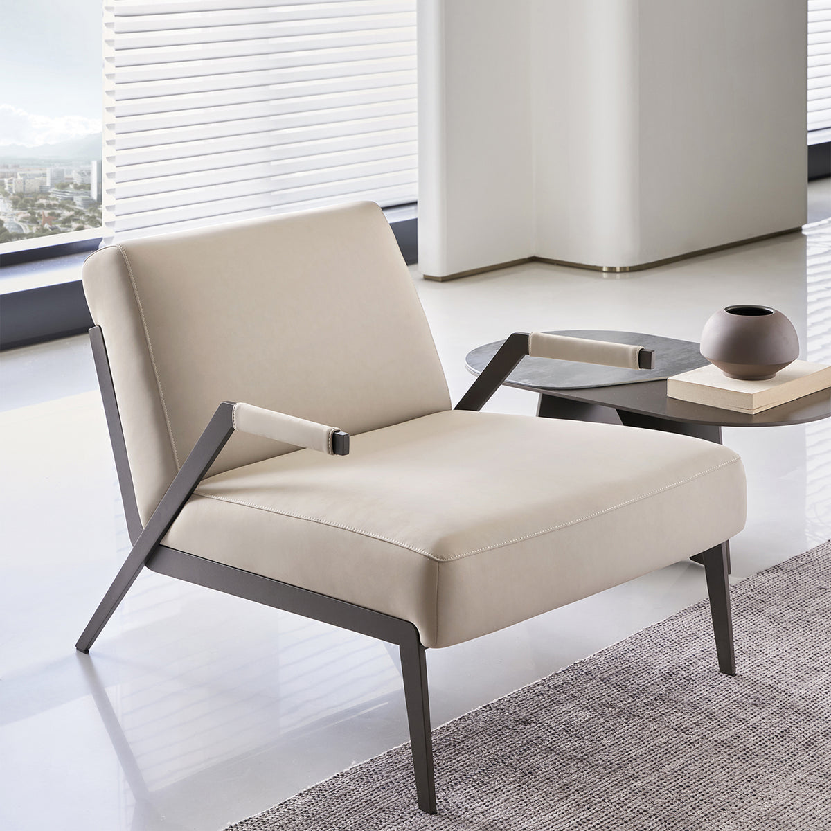 Desert beige leather lounge chair by BEACON, stylish and comfortable lounge chair with plush cushioning and sleek design.