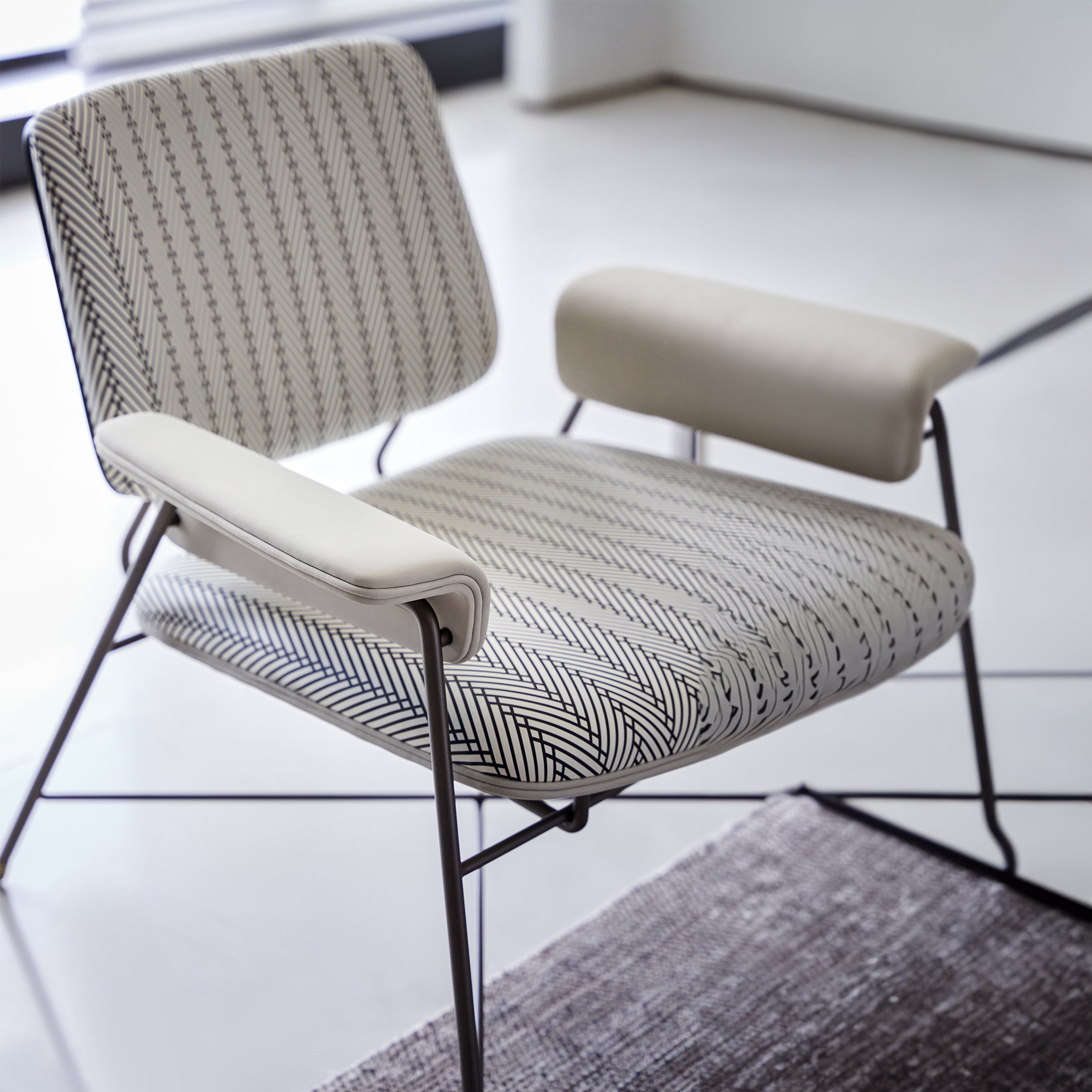BEACON Desert Lounge Chair AMBO DY8081 in sandy-colored fabric with a modern design and wooden legs.