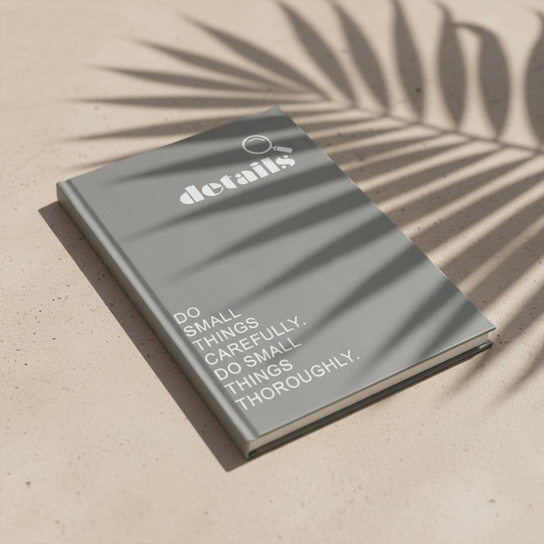 Decorative book titled "Details" by BEACON, featuring intricate cover design, perfect for home decor or display.