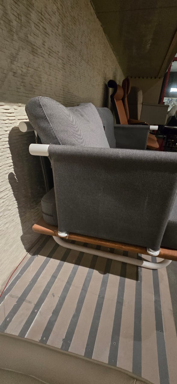 Outdoor Efsane 2-seater sofa by SANCREA, displayed on a patio with cushions and wooden frame, model Sanc-Efsa-039 Nakheel.