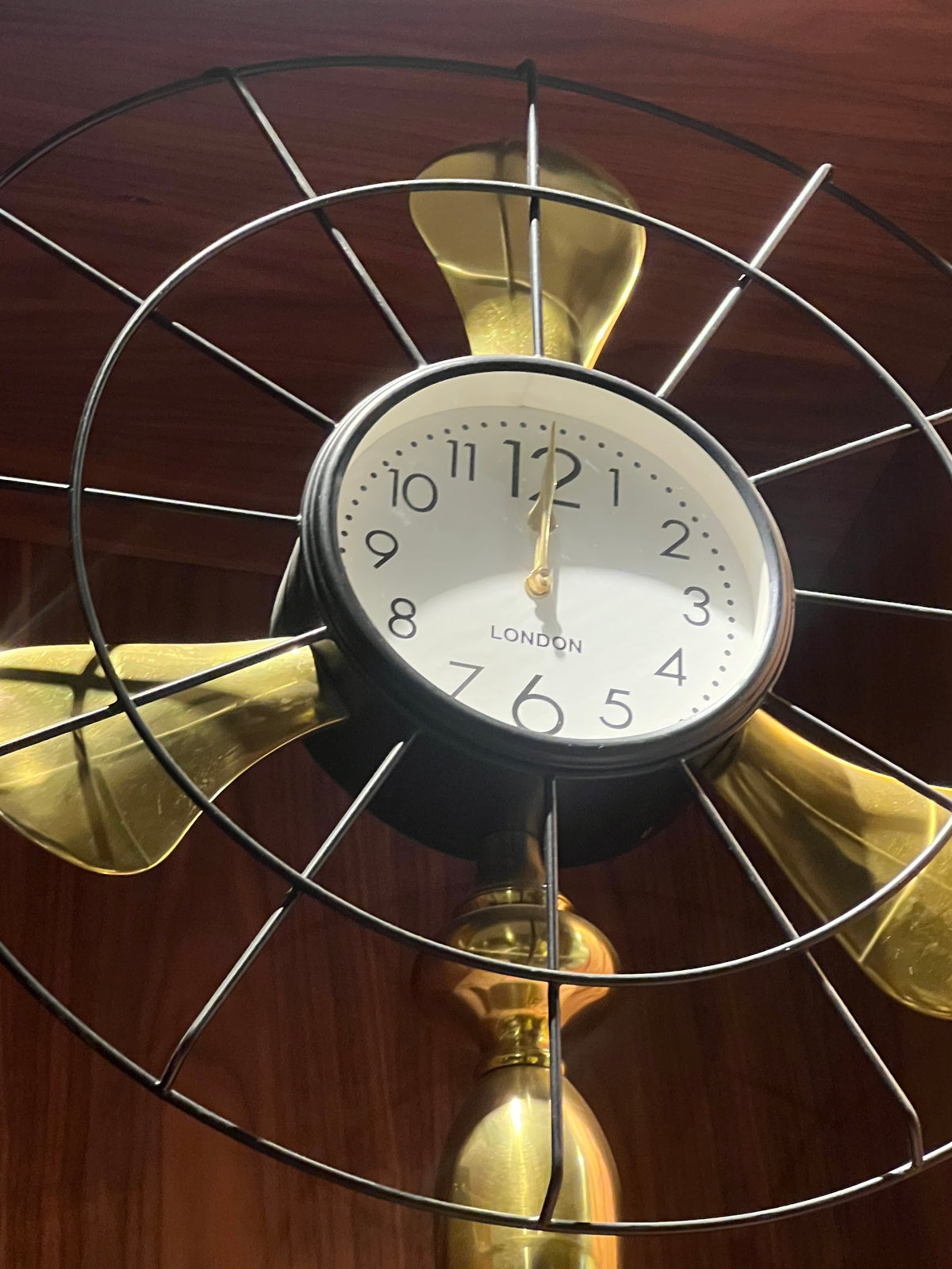 Fan-style table clock from Sagebrook Home, model 14840-02 Nakheel, featuring a decorative fan design perfect for home decor.