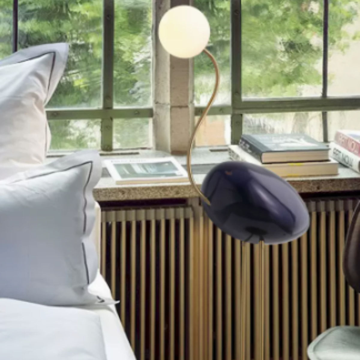 Black Flamingo Floor Lamp by BEACON, tall decorative floor lamp with a sleek flamingo design for modern living spaces.