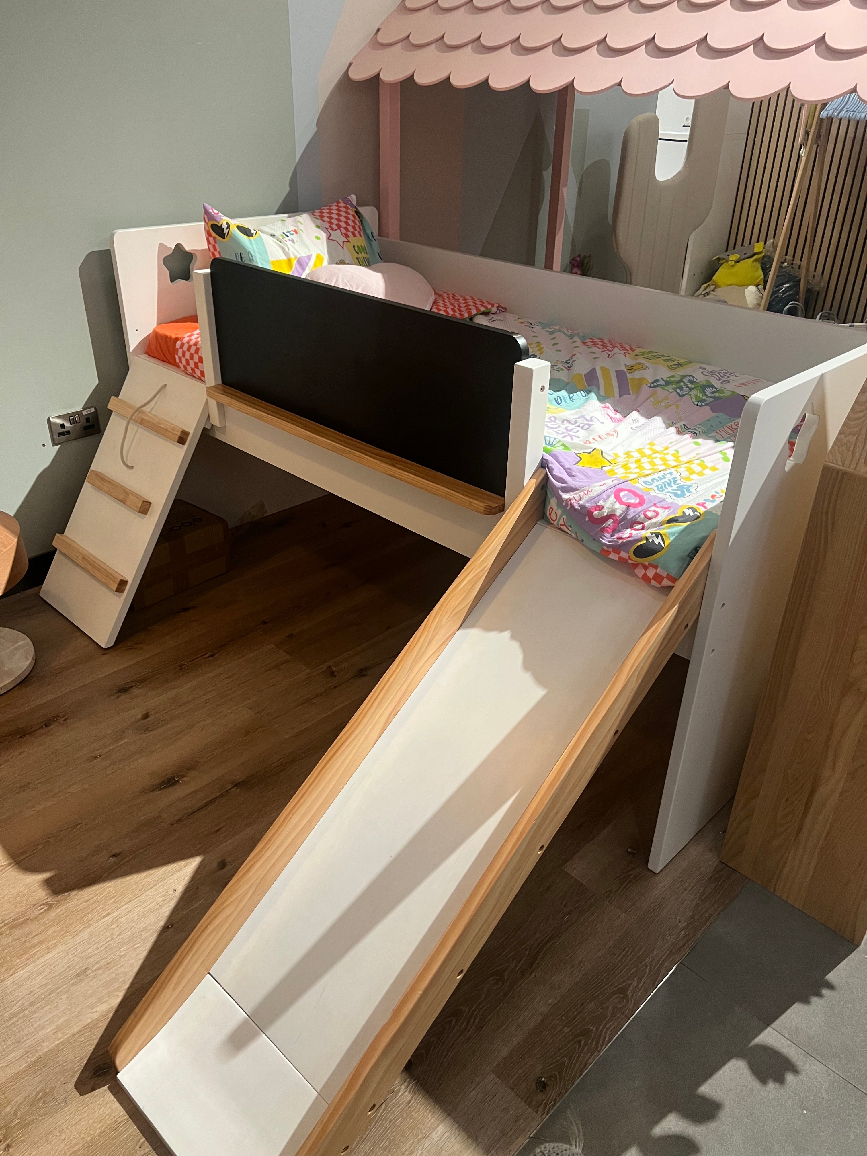 Display of a fun kids bed model HK-C004 Nakheel by BEACON, featuring colorful, playful design for children's bedrooms.