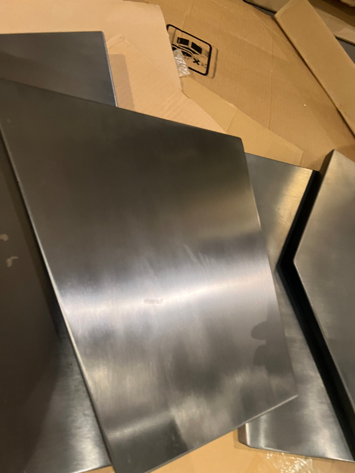 Handcrafted stainless steel artwork Nakheel display item by BEACON, showcasing intricate metal craftsmanship and modern design.