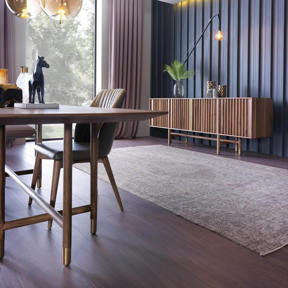 Display image of Pietra Dining Table by HOMAGE KOLTUK, showcasing its elegant design and wooden surface.