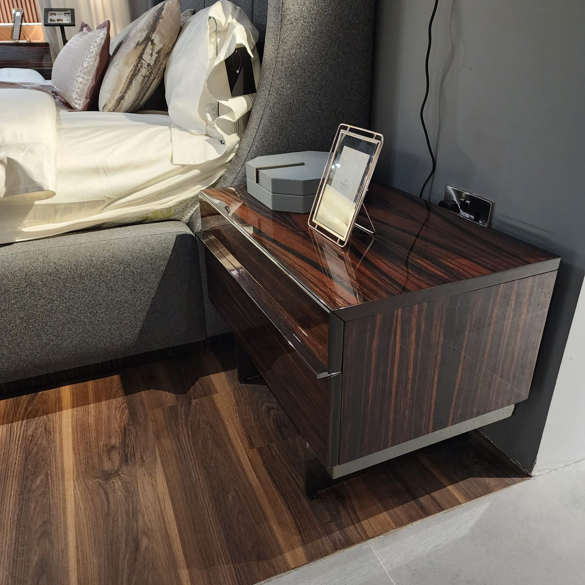 Display of Prada Elegant Bedroom Set by NILLS Furniture Design, showcasing stylish bedroom furniture with a sophisticated design.