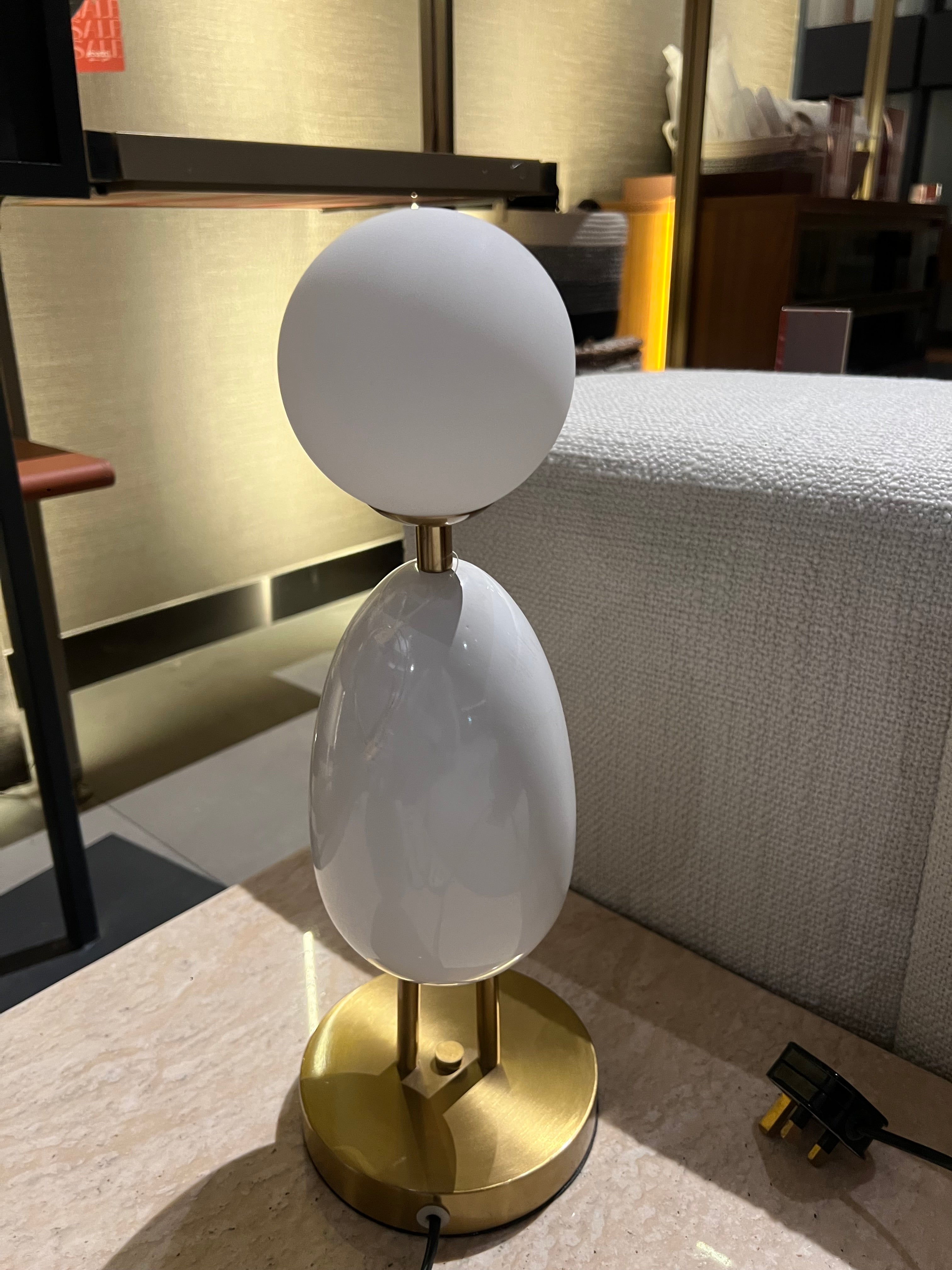 White table lamp by BEACON, model CY-LTD-1011-W, displayed as a stylish table lamp with a sleek design and modern finish.
