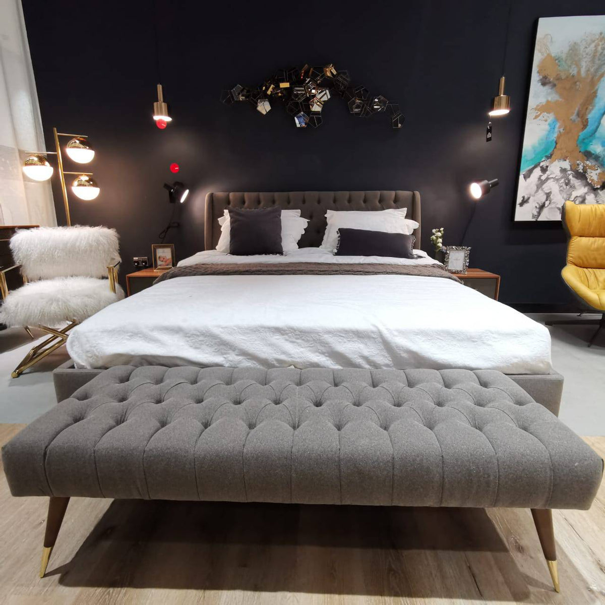 Display piece of the Alvin full bed set by Nills Furniture Design, featuring a modern bedroom display with bed and bedding.
