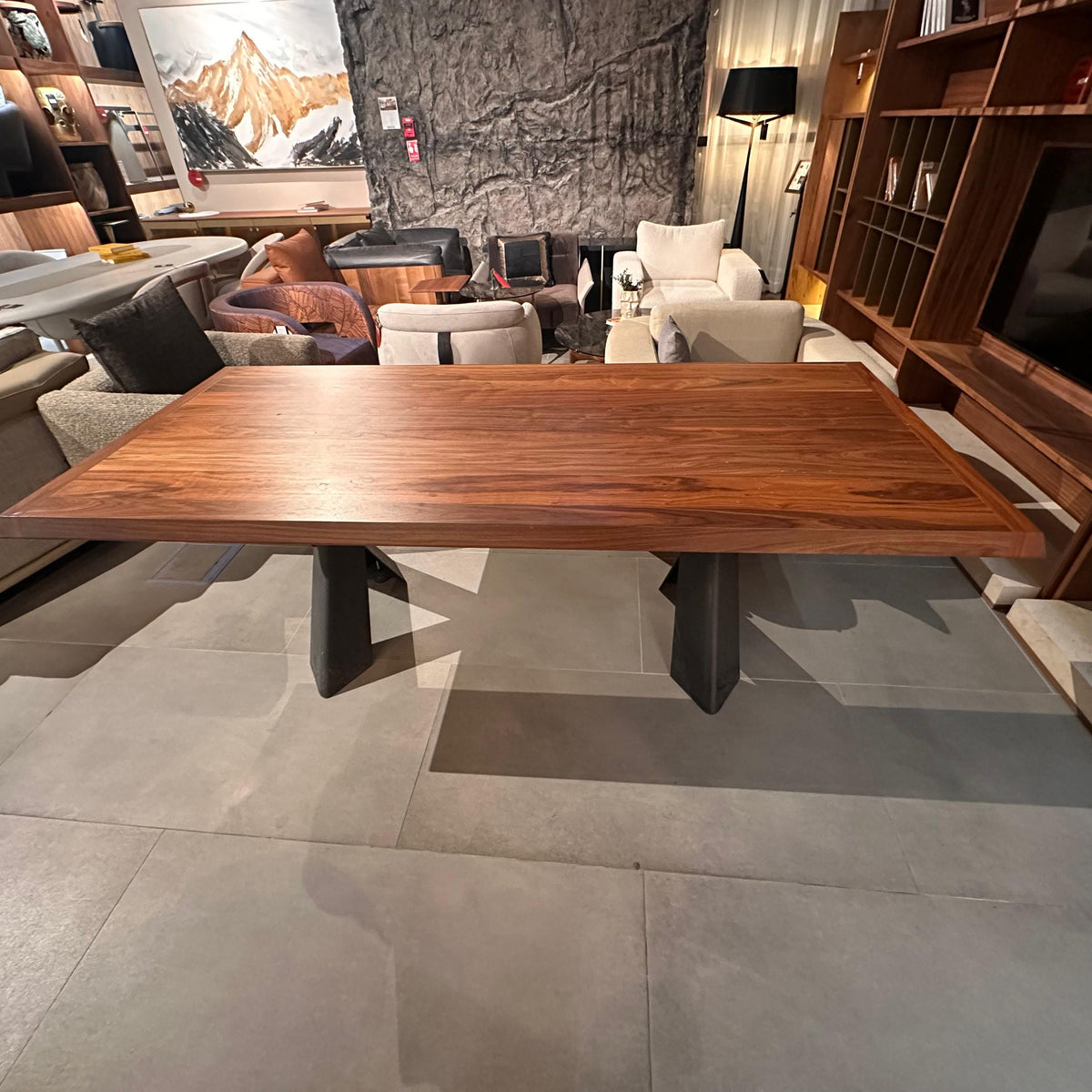 Display piece of the Genova dining table by YOL LIVING, showcasing the wooden tabletop and sturdy legs.