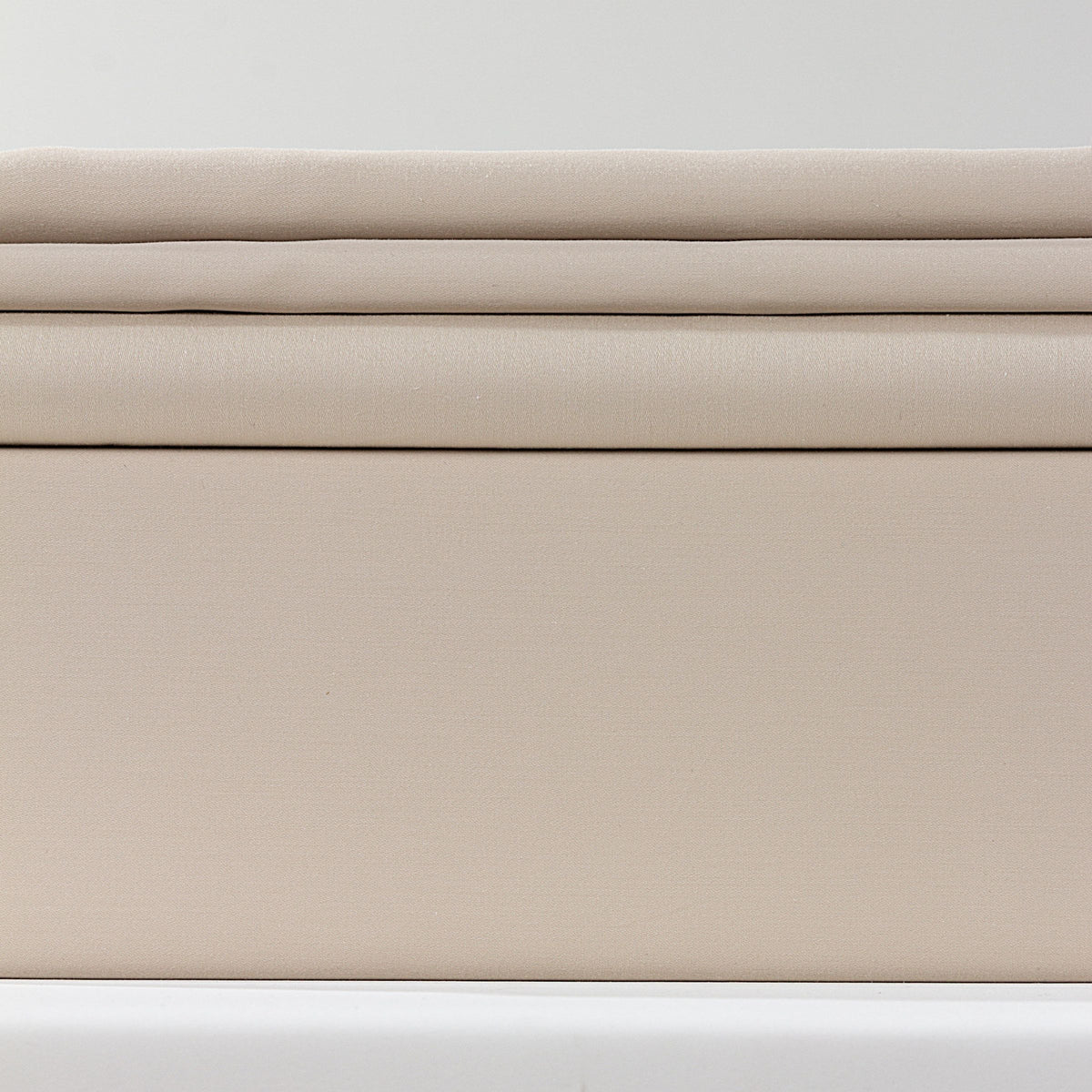 Beige bedding set by BEACON with duvet cover and pillowcases, 245x260cm and 220x240cm, in a cozy bedroom display.