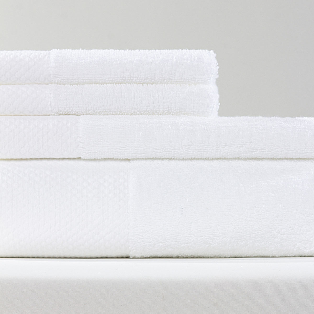 Set of ebarza Dobby Border Towels by BEACON featuring elegant border design, made from soft, absorbent fabric for everyday use.