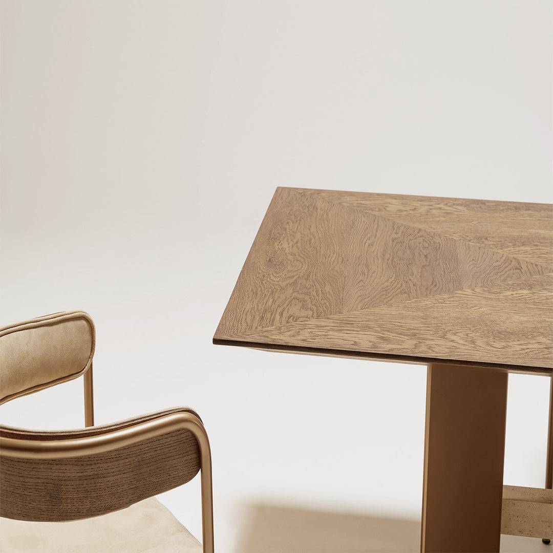 Modern Edessa dining table by HOMAGE KOLTUK with marble legs, featuring a sleek wooden tabletop and contemporary design.
