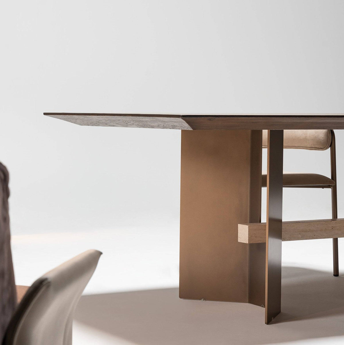 Edessa dining table by HOMAGE KOLTUK with a sleek marble-leg design, ideal for modern dining rooms.