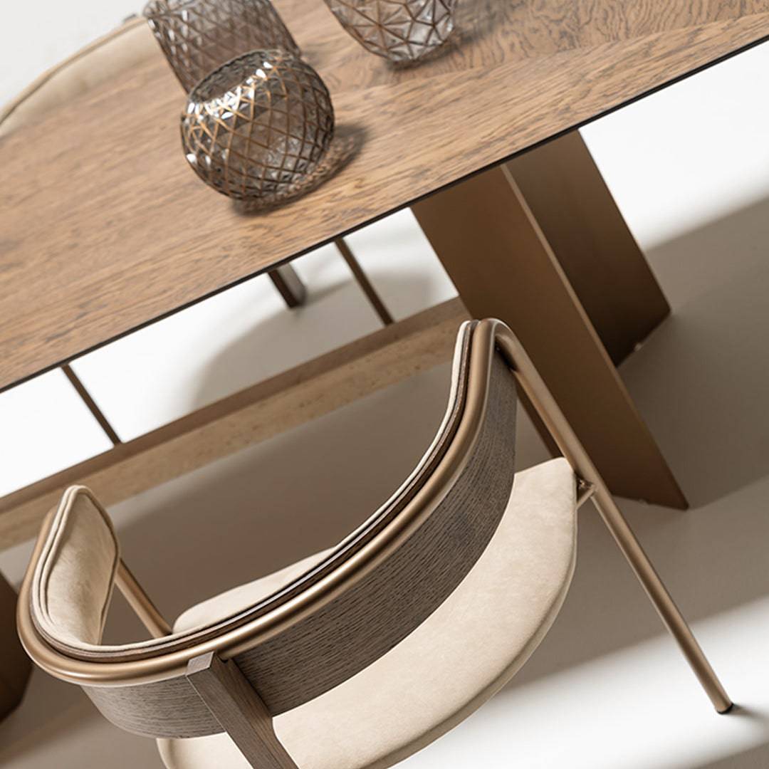 Edessa dining table by HOMAGE KOLTUK featuring a sleek marble-leg design, perfect for modern dining spaces.