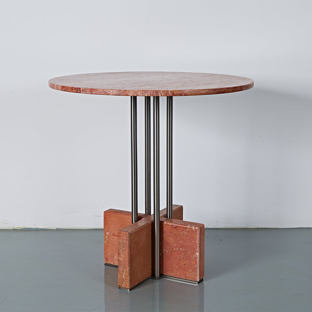 Elysian Travertine Dining Table by BEACON, modern rectangular table with travertine top and sturdy wooden legs in a dining room setting.