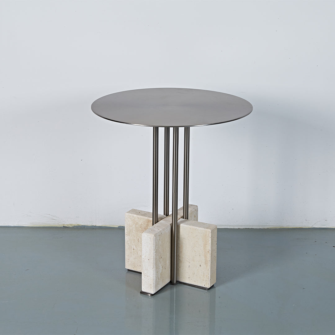 Elysian Travertine Side Table by BEACON with a sleek travertine top and modern design, suitable for living room decor.