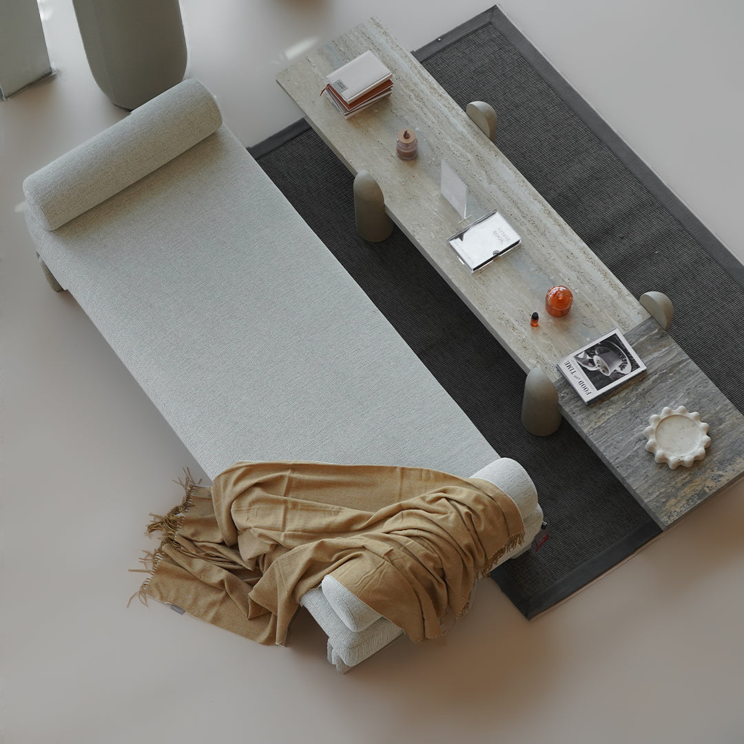 Soft EmberWrap throw blanket by BEACON, 380GSM, cozy textured blanket shown in neutral color on a bed or sofa.