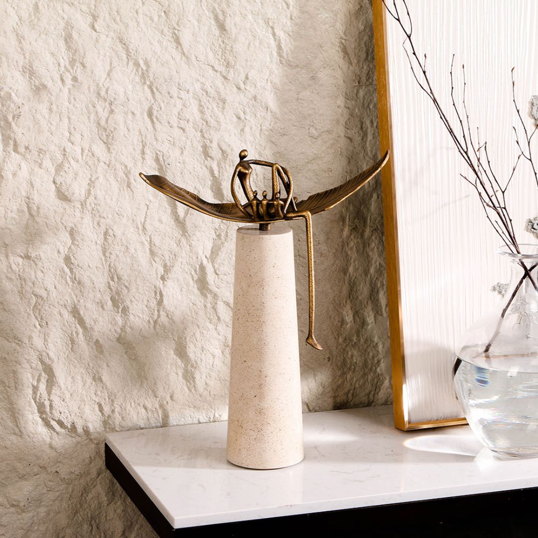 Family harmony sculpture by BEACON, a home decor figurine depicting a joyful family group in a warm setting.